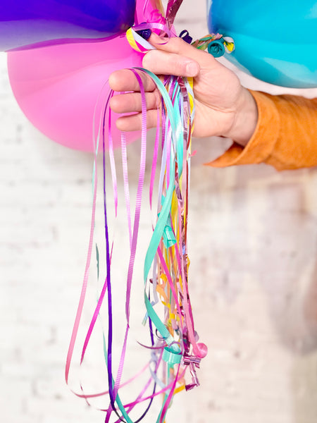 bright unicorn helium balloon bouquet tails
